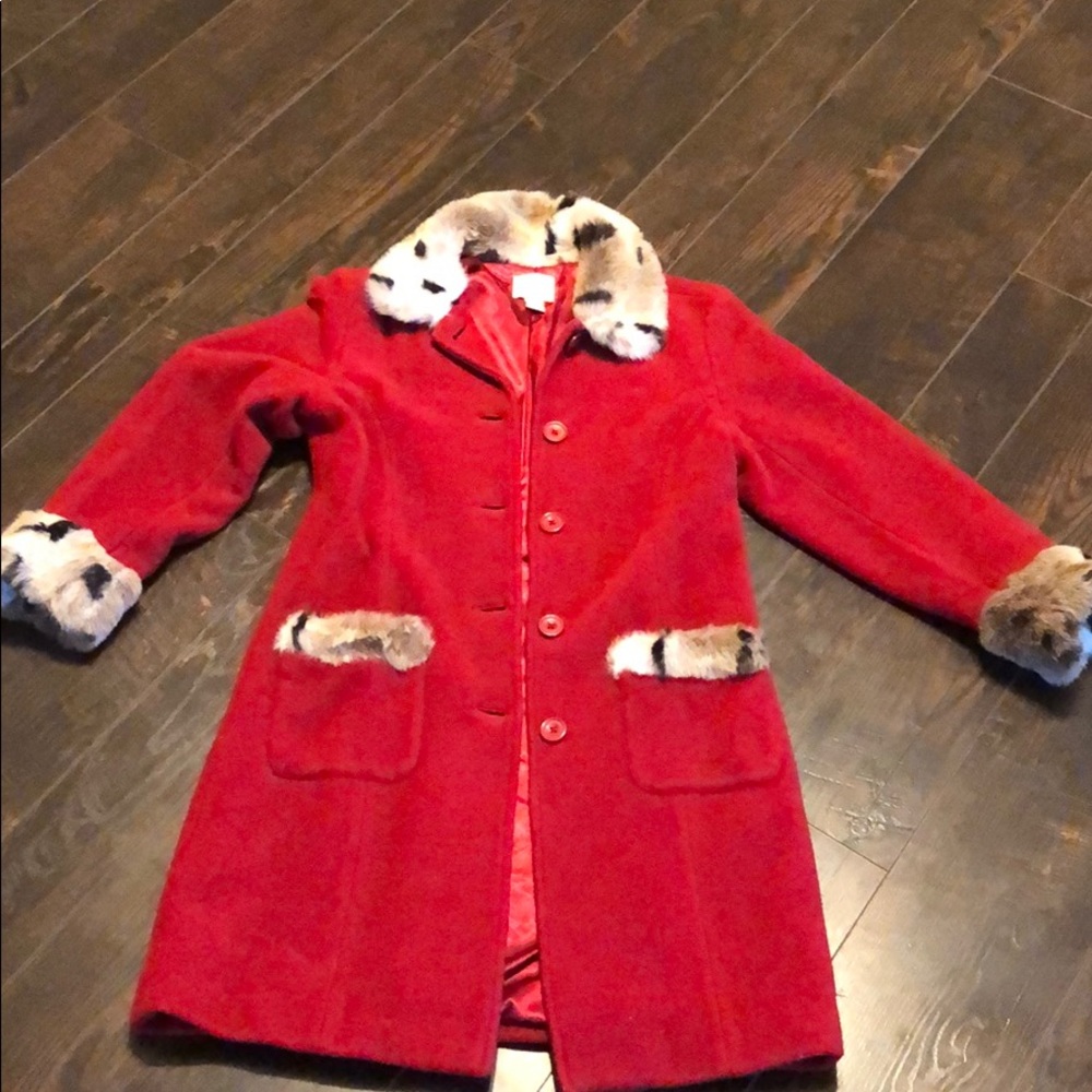 Children place coat